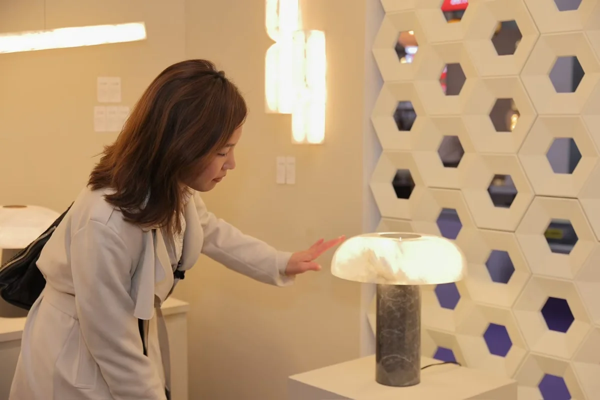 Visitors Discover the Marble Table Lamp Collection